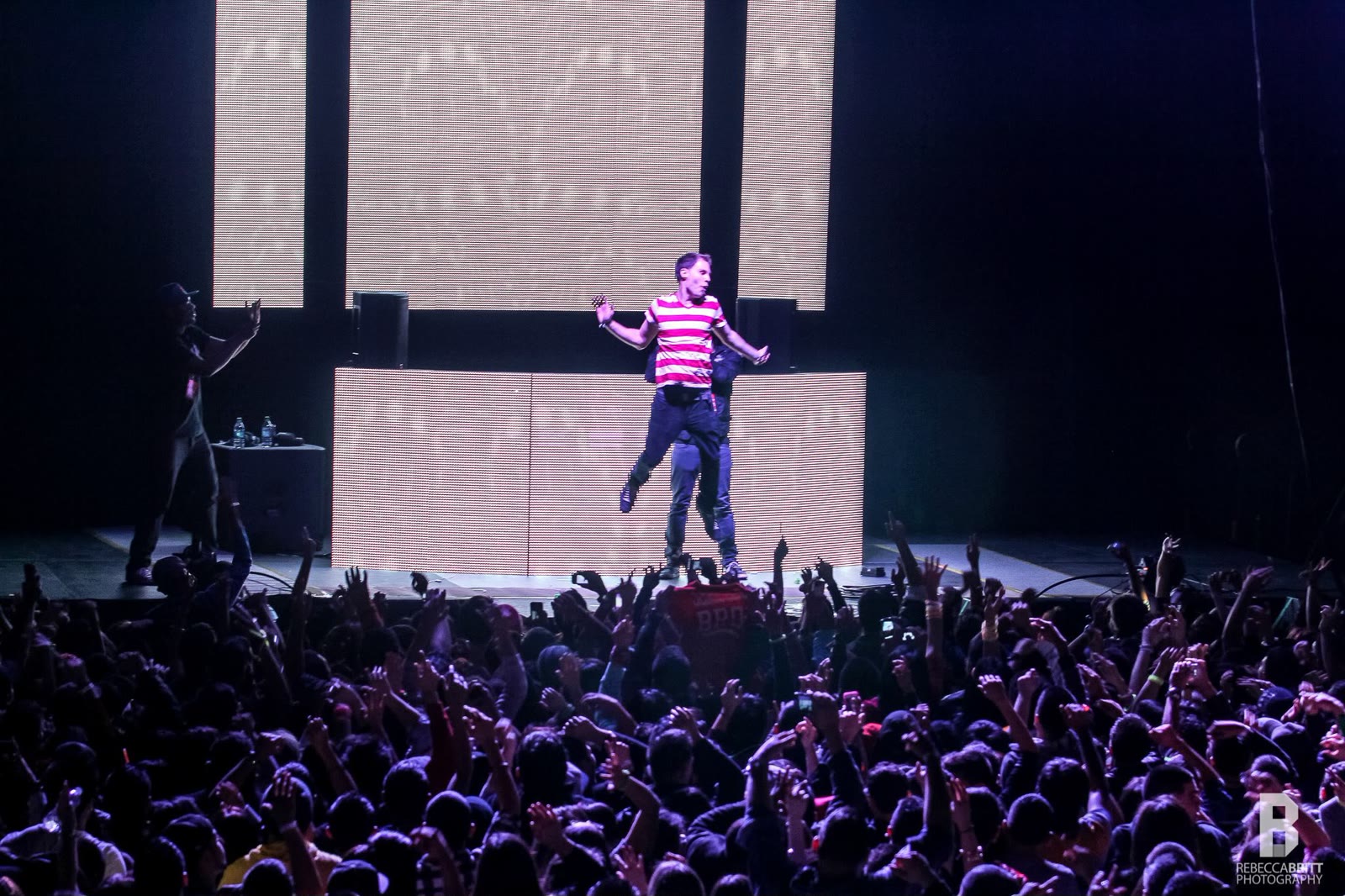 DJ Ori on top of the booth over the crowd