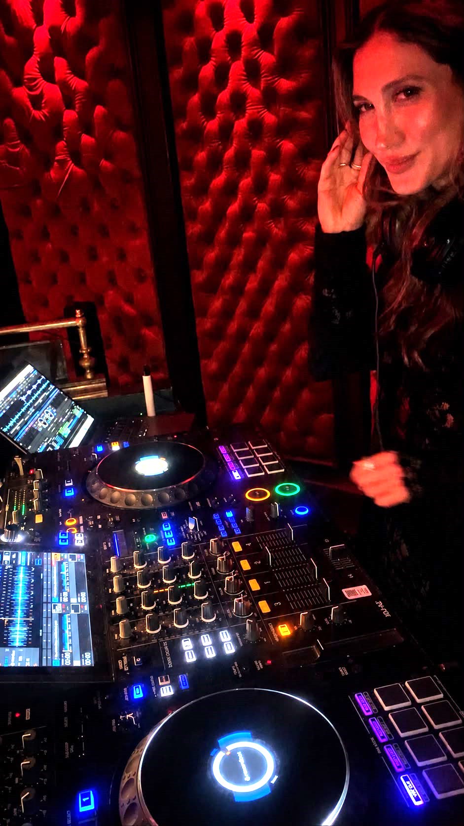 DJ RiRi at the DJ booth at a Los Angeles venue