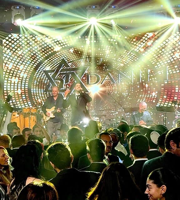 Ofek Ben Harush performing live on a concert stage